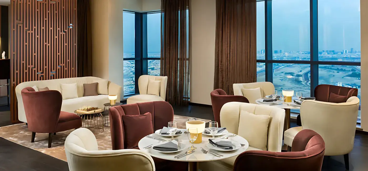 Dinner area view of Millennium Place Barsha Heights Hotel Dubai